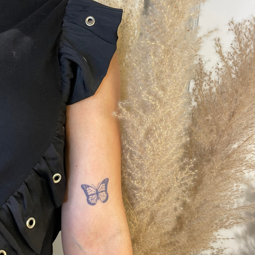 Papillon de tatouage temporaire